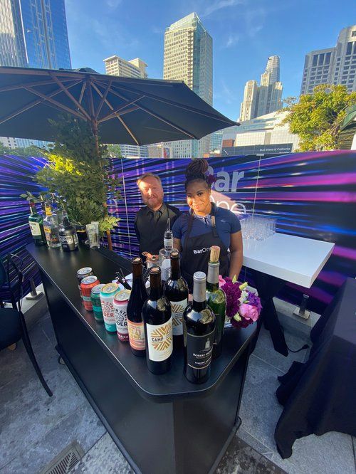 Guests mingling at a private event on the Joyride Pizza patio