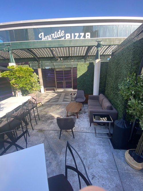 Detroit-style pizza served to event guests