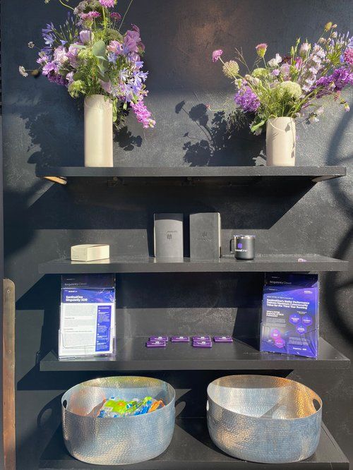 Guests sharing pizza at a long event table